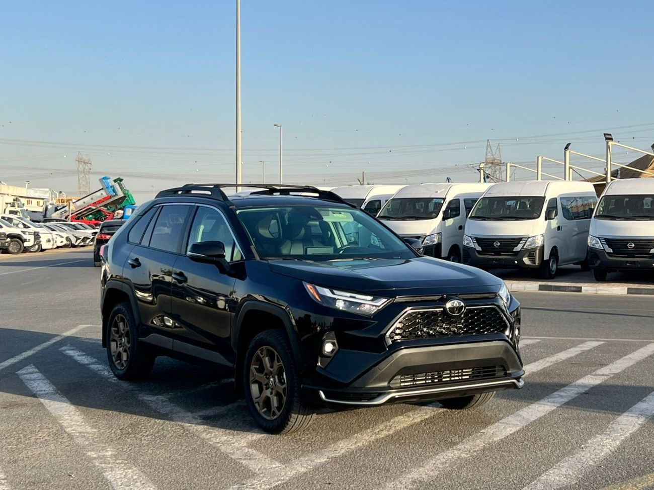 تويوتا راف ٤ 2023 Toyota RAV4 Hybrid Wood Land Edition 2.5L V4 - AWD 4x4 - Rear Camera - Leather Seats