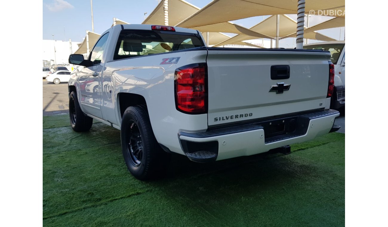 Used Chevrolet Silverado Painting agency alloy wheels in excellent