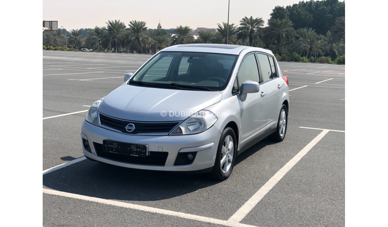 نيسان تيدا موديل 2012 خليجي فل مواصفات فتحه سقف مالك واحد من الوكاله مفتاحين فل مواصفات فتحه سقف