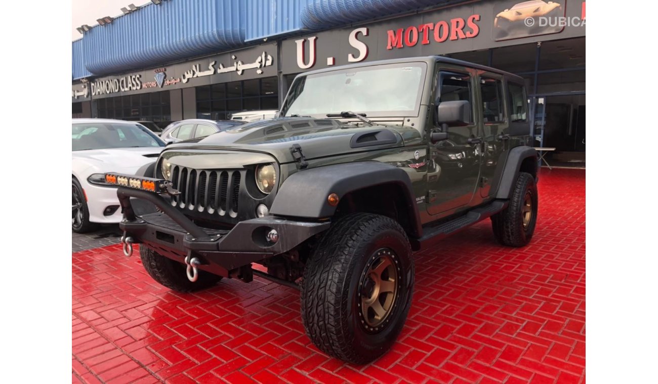 جيب رانجلر UNLIMITED (MILITARY GREEN) GCC 2015 LOW MILEAGE IN MINT CONDITION