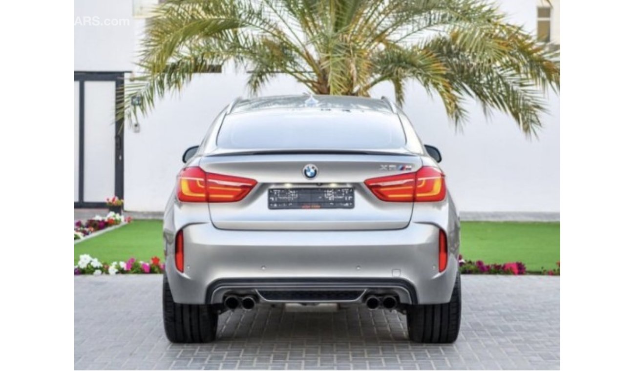 BMW X6M under warranty and service contact