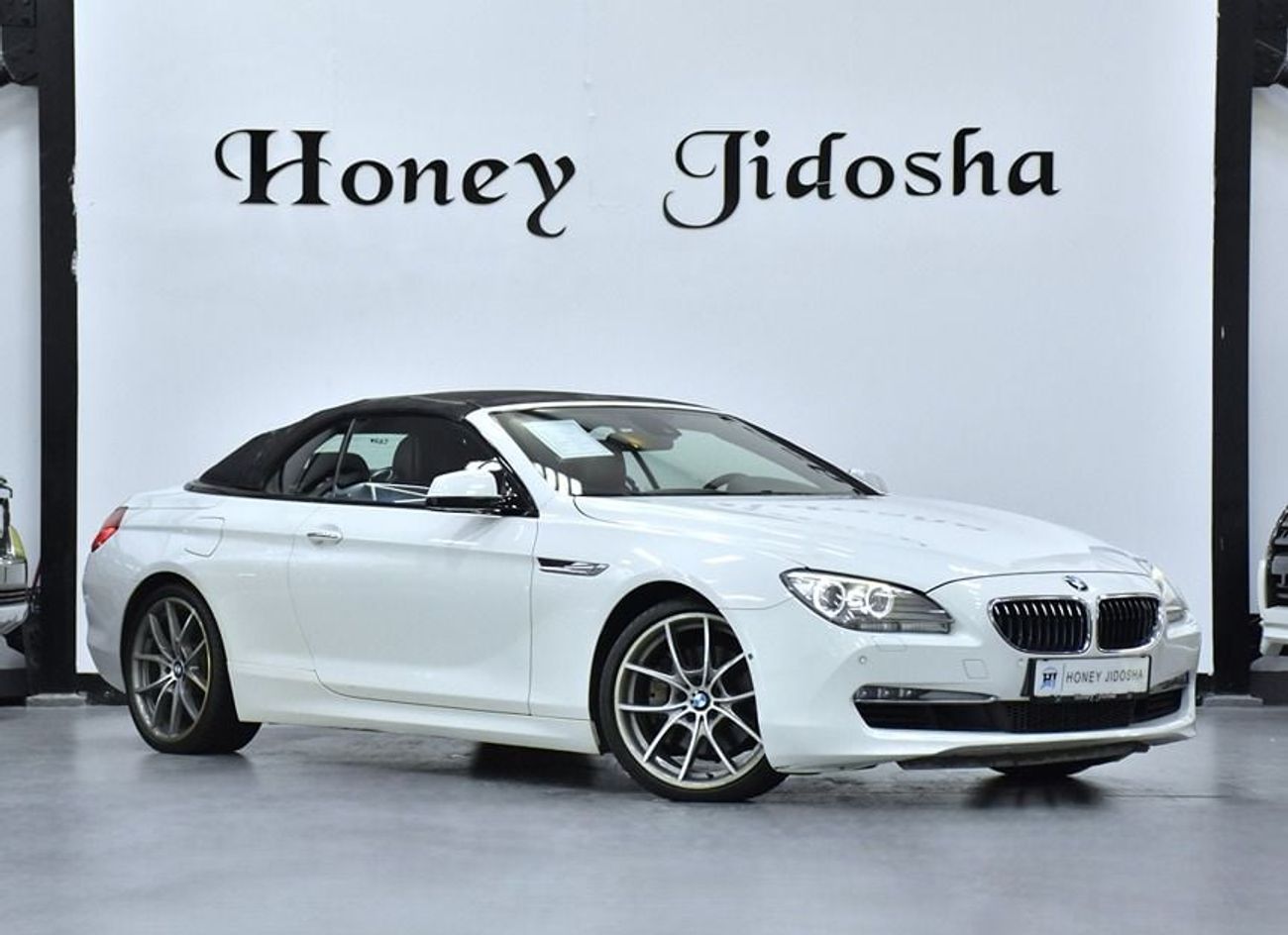 BMW 650i EXCELLENT DEAL for our BMW 650i CONVERTIBLE ( 2011 Model ) in White Color GCC Specs
