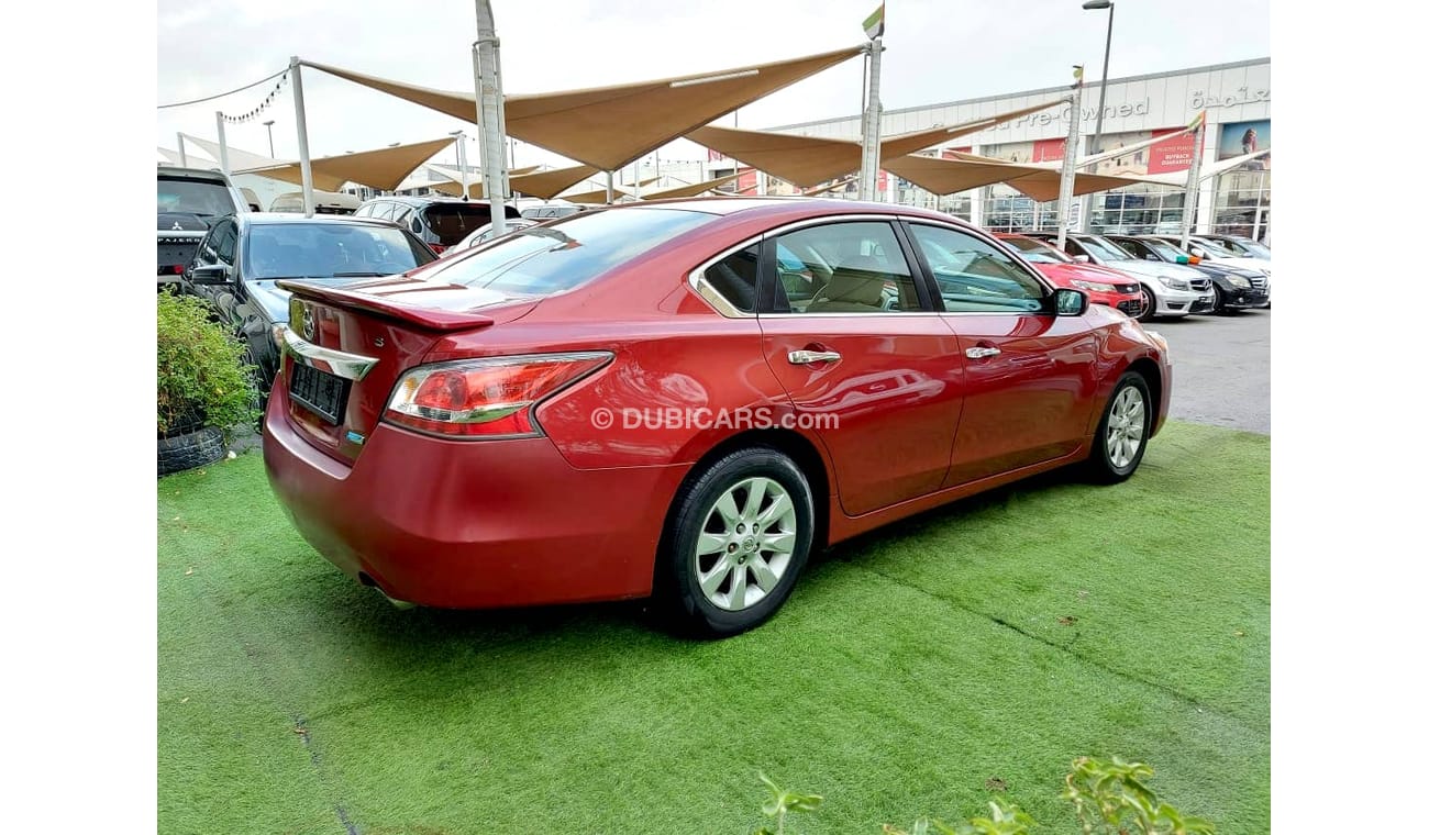 Nissan Altima 2014 model, American import, burgundy color, inside beige, cruise control, in excellent condition, y