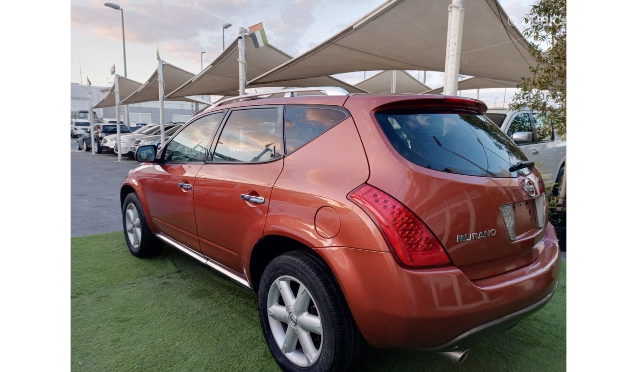 Nissan Murano Model 2008 Gulf Orange color number one Leather alloy wheels sensors in excellent condition, you do