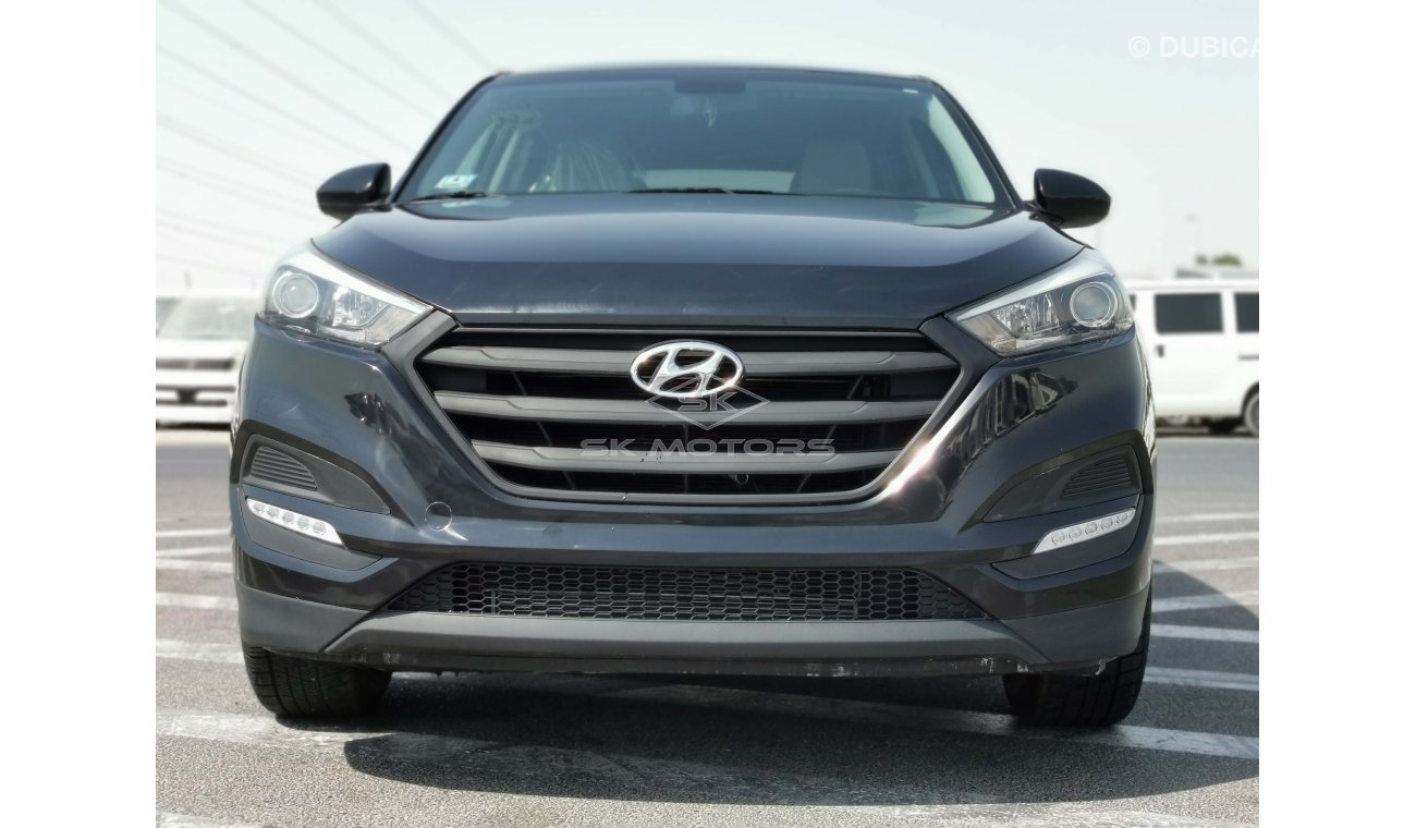 Hyundai Tucson 2.0L, 17" Rim, DRL LED Headlights, Fog Light, Drive Mode, DVD, Rear Camera, Dual Airbags (LOT # 782)