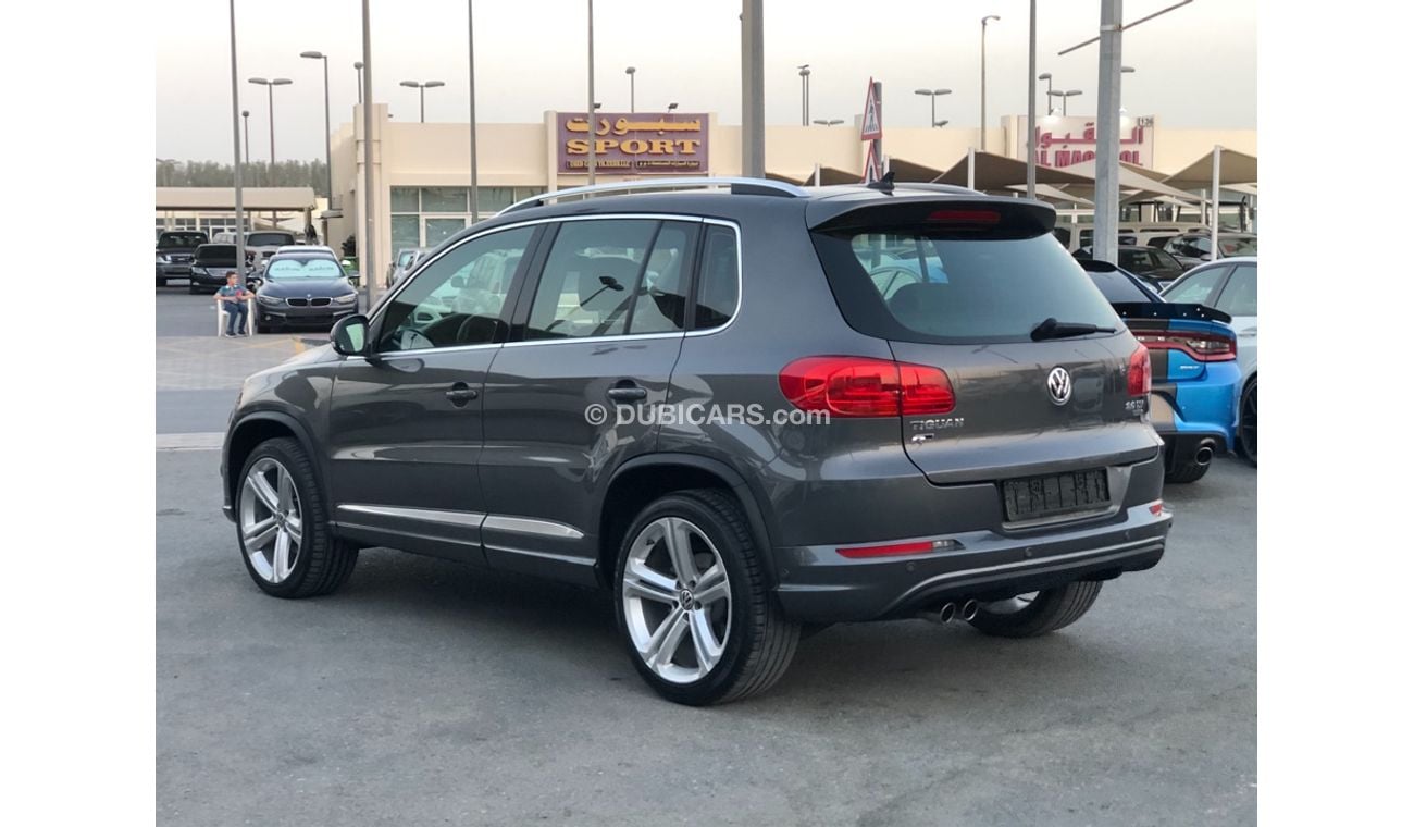 فولكس واجن تيجوان تيجوان R موديل 2014 خليجي فل مواصفات كراسي جلد ومثبت سرعه وتحكم كهربي كامل ونظام صوت ممتاز وكاميرا خ