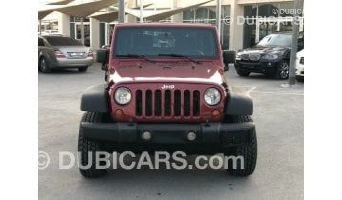 Jeep Wrangler Wrangler Sport 2012 model in excellent condition, inside and out