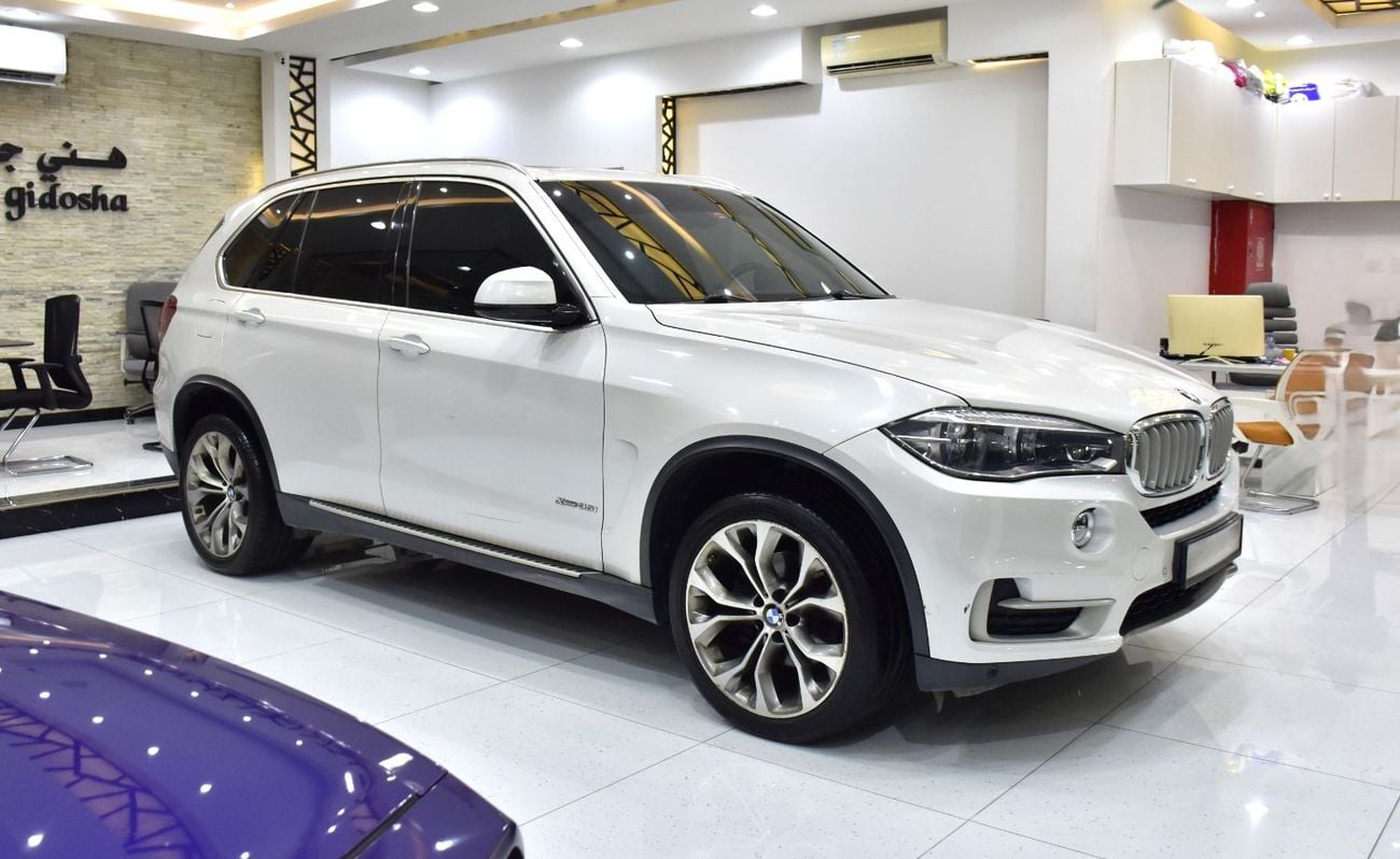 BMW X5 35i EXCLUSIVE EXCELLENT DEAL for our BMW X5 xDrive35i ( 2015 Model ) in White Color GCC Specs