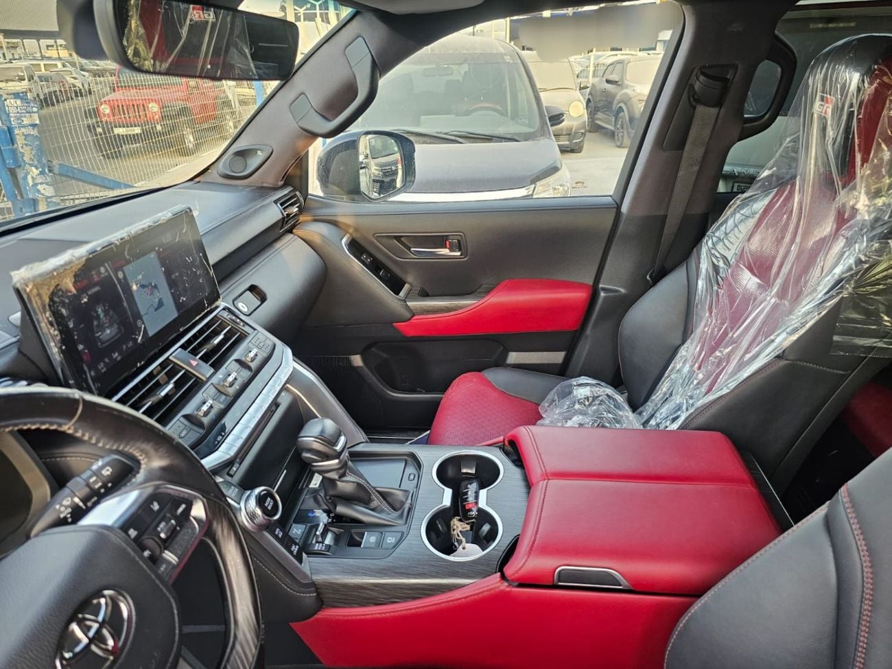 تويوتا لاند كروزر Toyota landcruise 2022MODEL twin turbo Gr sports 3.5 petrol v6 Colour Black Interior Red push start 