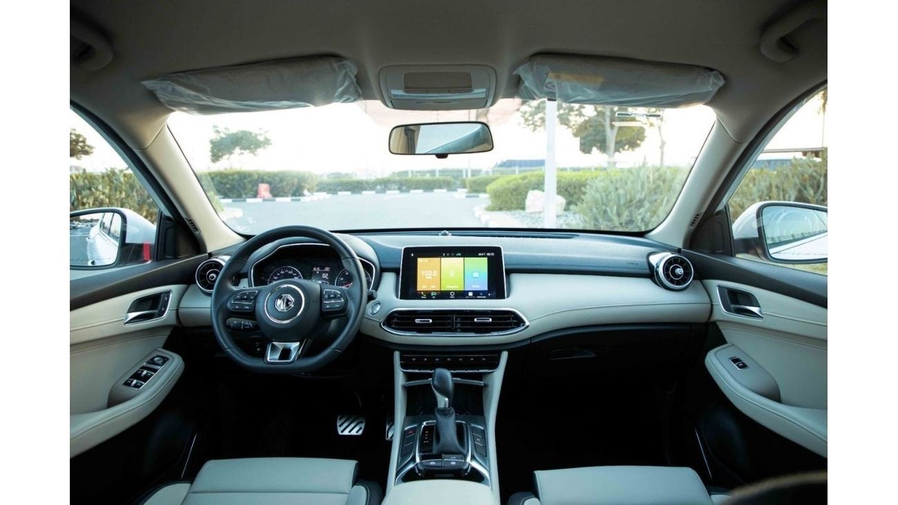 أم جي HS 2023 إم جي HS 4X4 2.0T LUXURY - أبيض لؤلؤي من الداخل بني | سعر التصدير