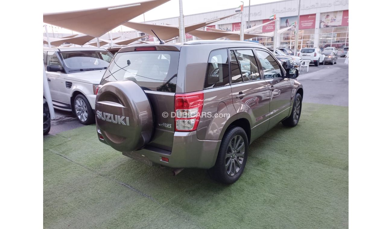 Suzuki Grand Vitara 2015 GCC model, agency dye, cruise control, alloy wheels, camera sensors, Android screen, in excelle