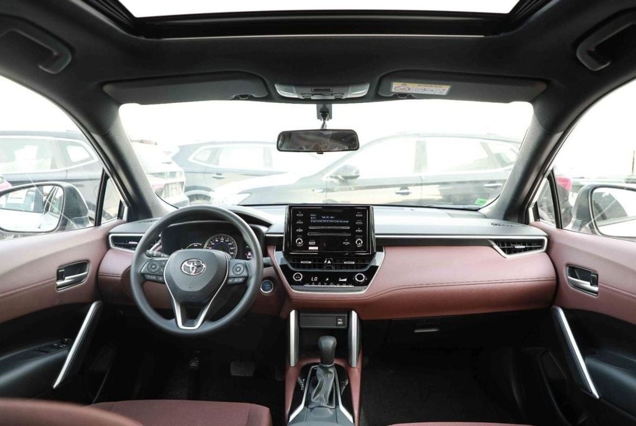 تويوتا كورولا كروس 2024 TOYOTA COROLLA CROSS 1.8 Hybrid MID - SILVER inside RED | Export Only