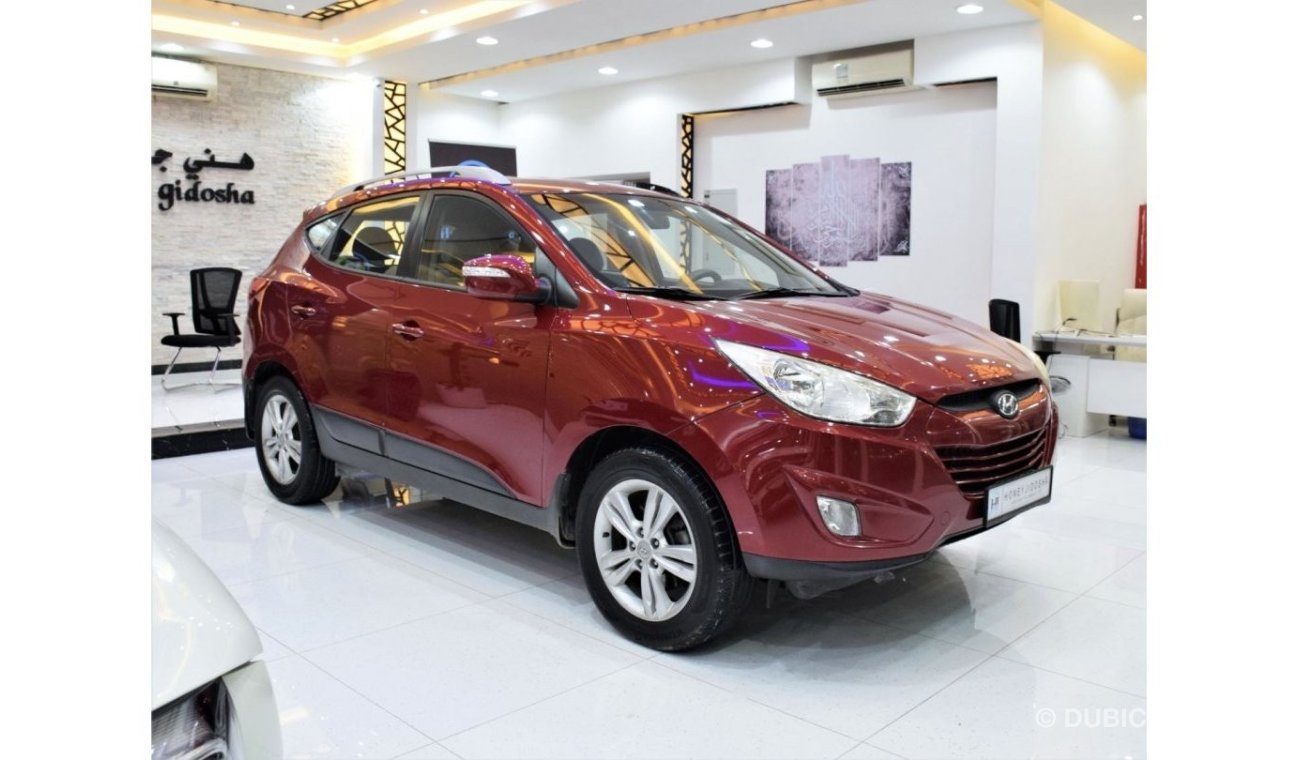 Hyundai Tucson GL EXCELLENT DEAL for our Hyundai Tucson 4WD ( 2012 Model! ) in Red Color! GCC Specs