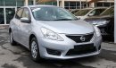 Nissan Tiida Pre-owned  for sale in Sharjah. Grey/Silver 2016 model, available at Wael Al Azzazi Shar