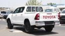 Toyota Hilux 2.4L diesel  . White 2025 model, M/T Wide body with Chrome bumper