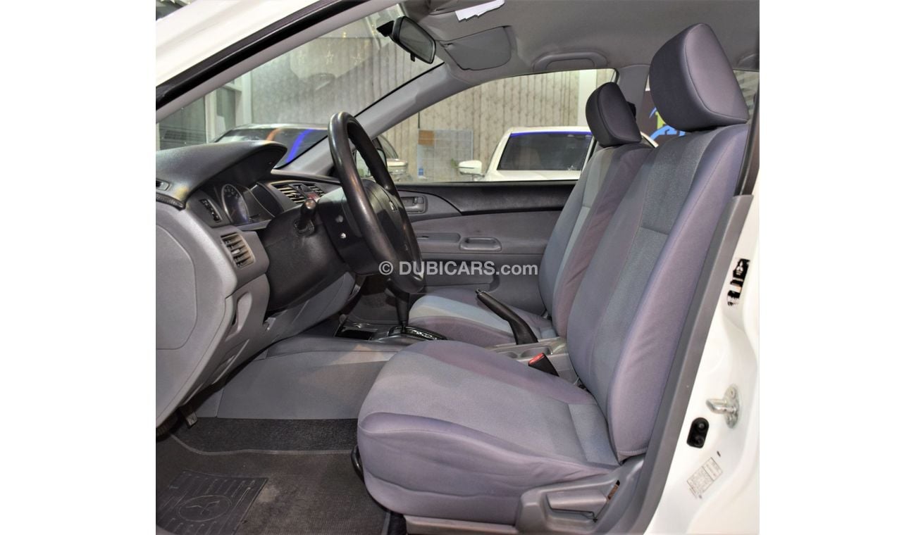 Mitsubishi Lancer EXCELLENT DEAL for our Mitsubishi Lancer 2012 Model!! in White Color! GCC Specs