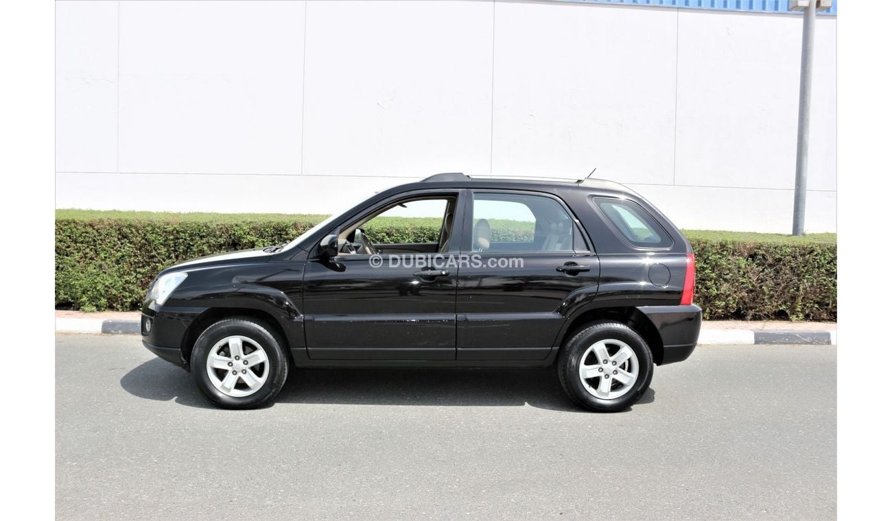 كيا سبورتيج كيا سبورتاج 2009 خليجي فل اوبشن جلد و فتحه فورويل 2700 سي سي