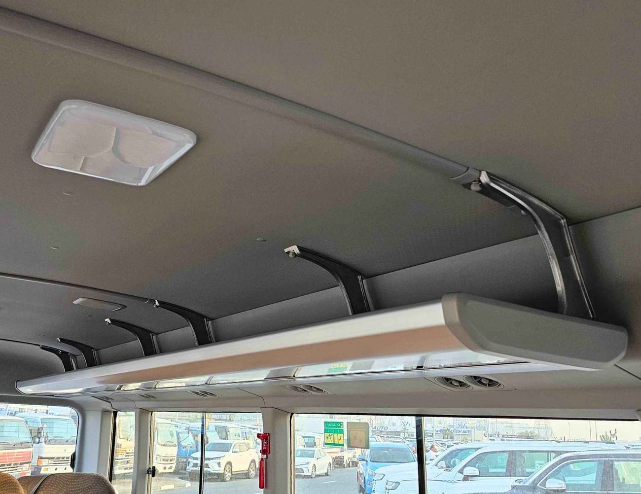 تويوتا كوستر 4.0L V4 DIESEL / 23 STR M/T / AUTO DOOR / BAGGAGE TRAY WITH RACK (CODE # COD4J)