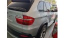 BMW X5 X DRIVE 4.8i 2009 GCC SPECS HEADS UP DISPLAY 7 SEATS