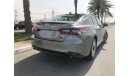 Toyota Camry TOYOTA_CAMERY_GRANDE_2023_3.5L_avaialable_white_black_hybrid