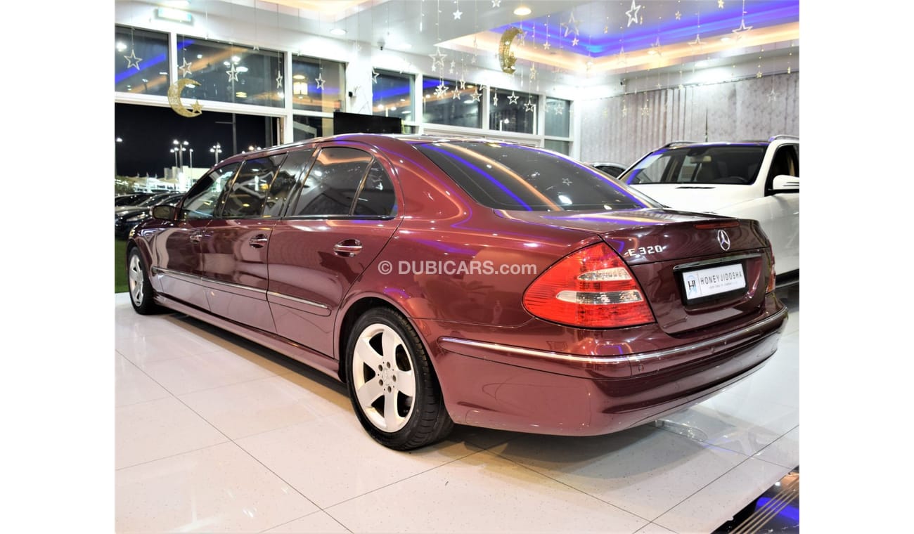 Mercedes-Benz E 320 EXCELLENT DEAL for our Mercedes Benz E320 ELEGANCE ( LIMOUSINE ) 2004 Model!! in Burgundy Color! GCC