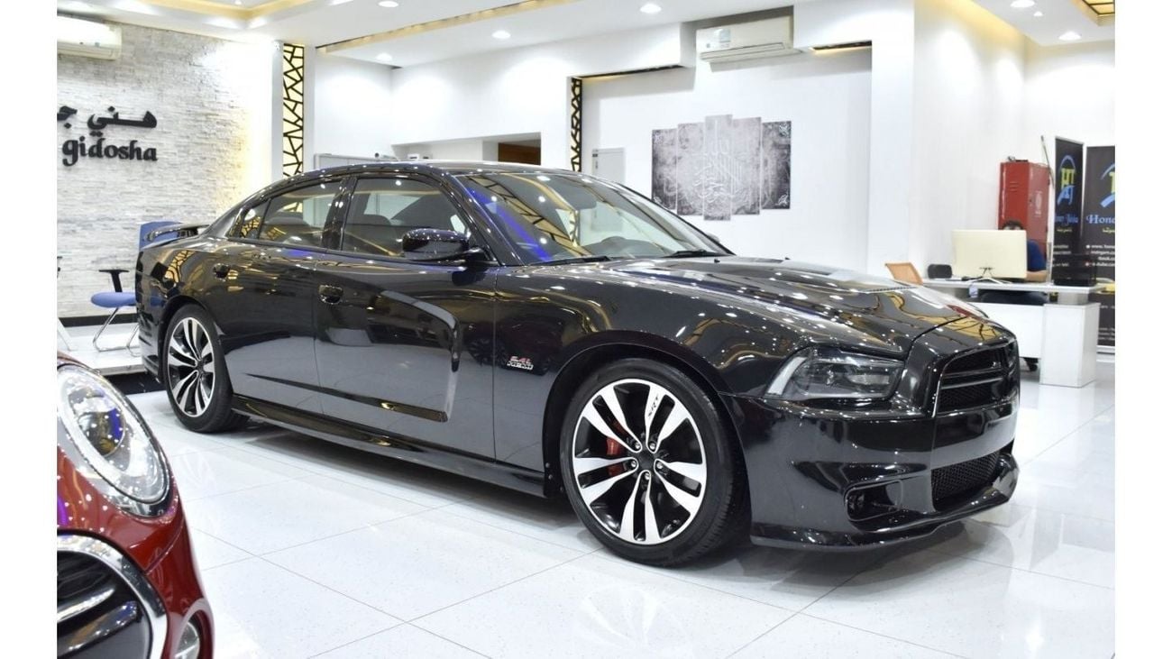 Dodge Charger EXCELLENT DEAL for our Dodge Charger SRT8 ( 2013 Model ) in Black Color GCC Specs