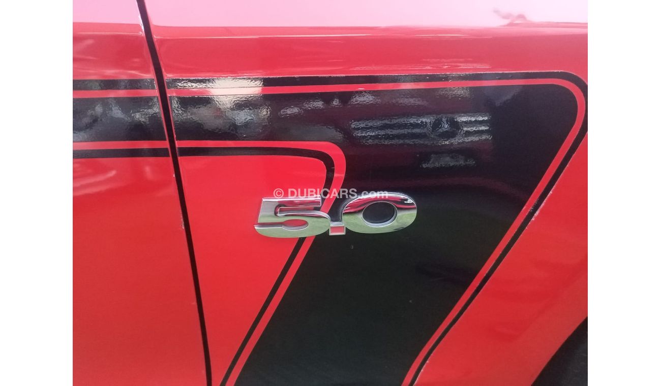 Ford Mustang 2014 GCC model, coupe, cruise control, rear camera, leather rear spoiler, in excellent condition