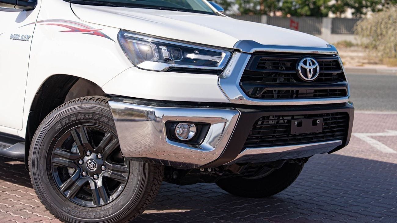 Toyota Hilux GLX 2.7L - Manual - White Inside Maroon | Export Only