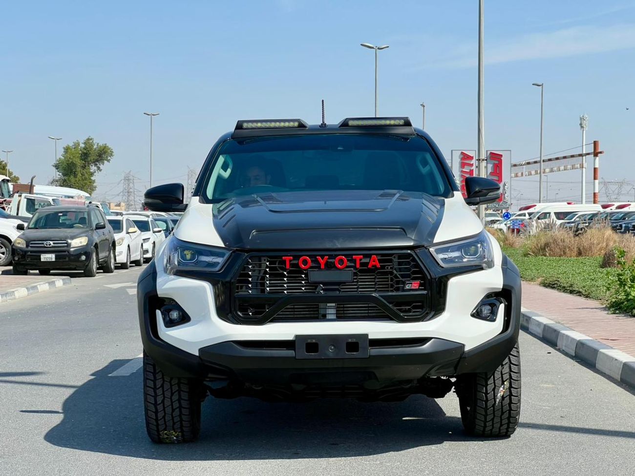 تويوتا هيلوكس The Toyota Hilux is a legendary, mid-size pickup truck known for its exceptional ruggedness, durabil