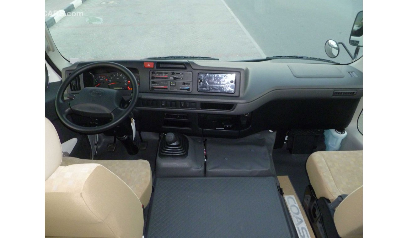 Toyota Coaster LHD -  4.2L DIESEL HIGH ROOF DSL MANUAL