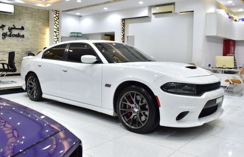 Dodge Charger SRT8 EXCELLENT DEAL for our Dodge Charger SRT ( 2015 Model ) in White Color GCC Specs