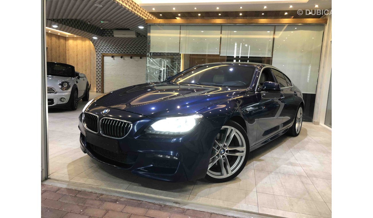 BMW 640i خليجي مالك واحد تشيكات وكالة فول اوبشن اربع فصوص كاميرات حساسات Display نفكيشن بصمة غراند كوبيه