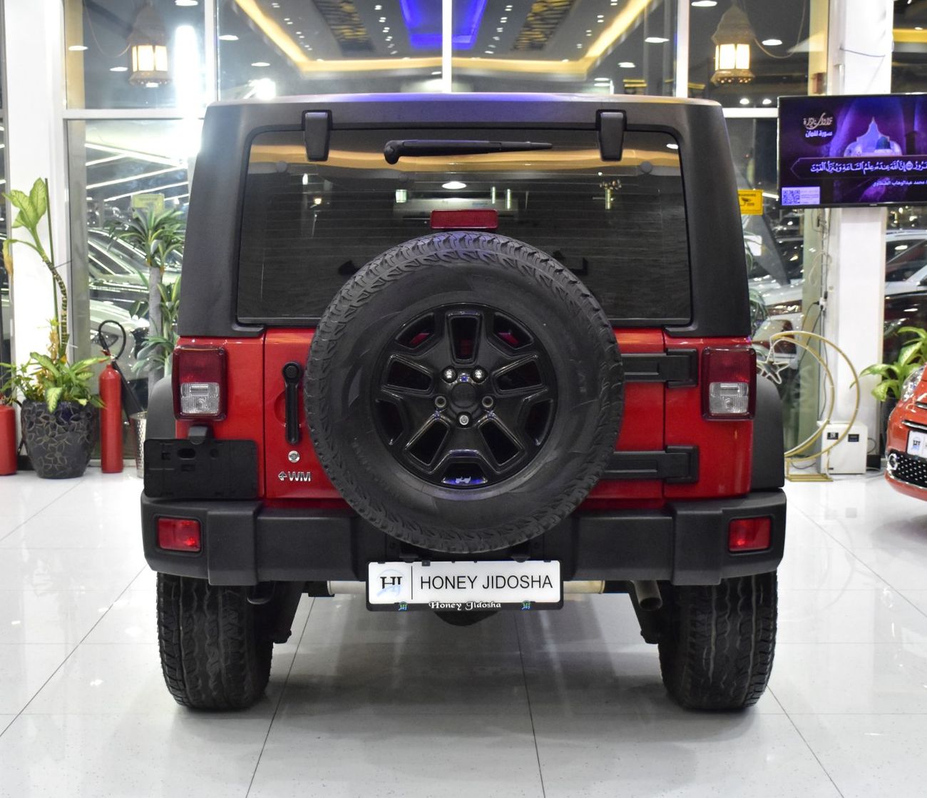 Jeep Wrangler EXCELLENT DEAL for our Jeep Wrangler Sport ( 2014 Model ) in Red Color GCC Specs