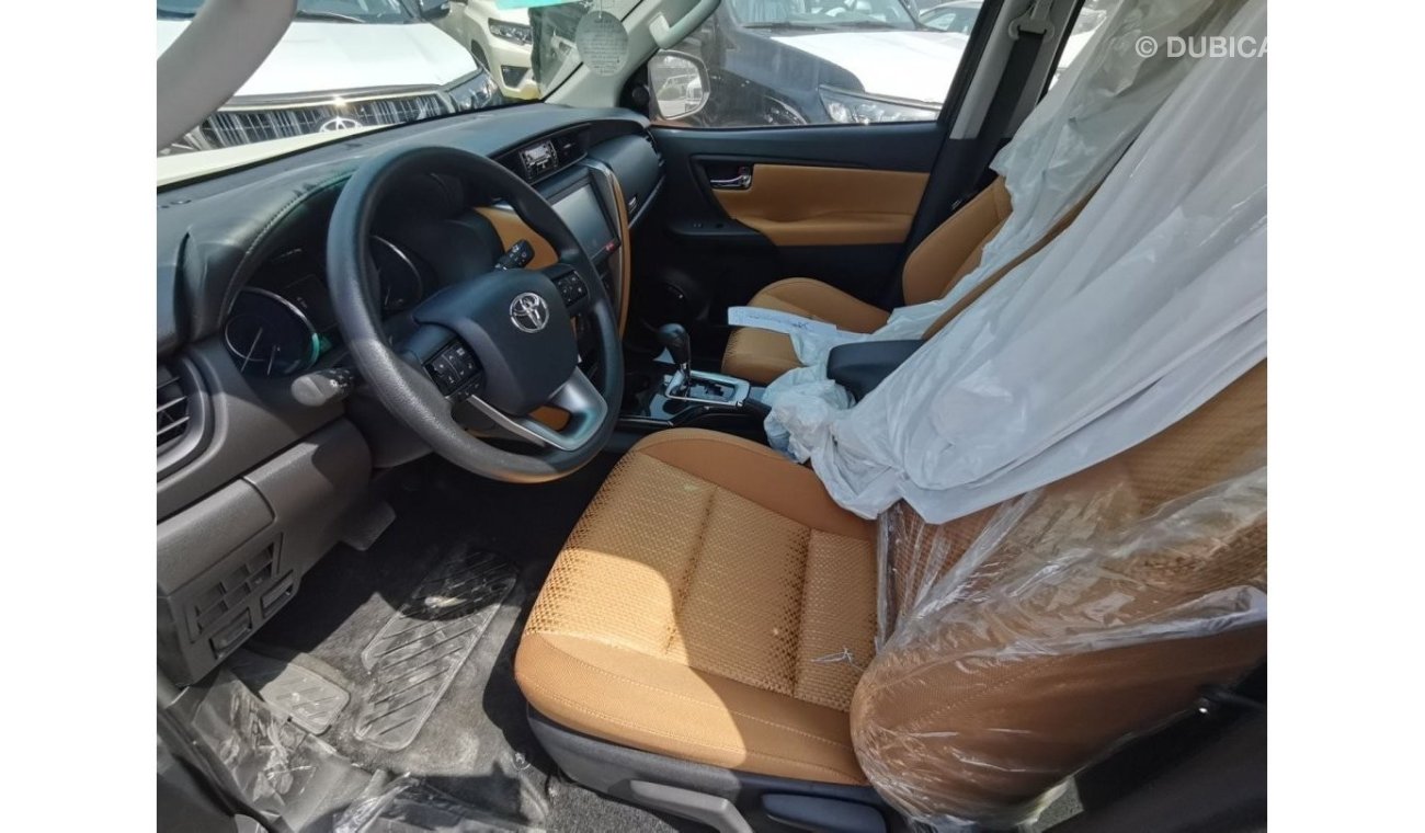 Toyota Fortuner 2023 Toyota Fortuner 2.7L petrol 4WD Gray inside brown, Saudi spec