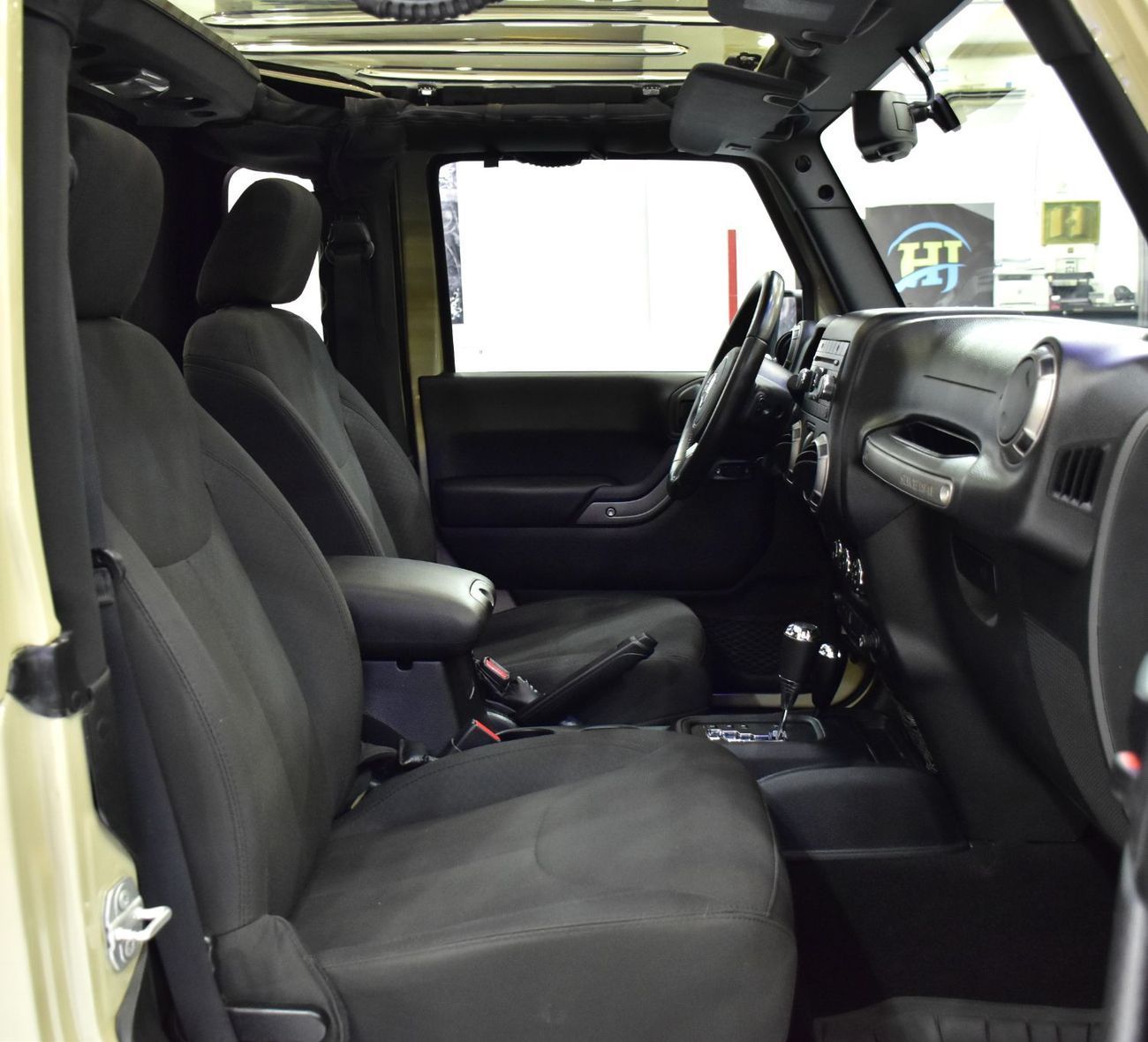 Jeep Wrangler EXCELLENT DEAL for our Jeep Wrangler JK Willys ( 2018 Model ) in Beige Color GCC Specs