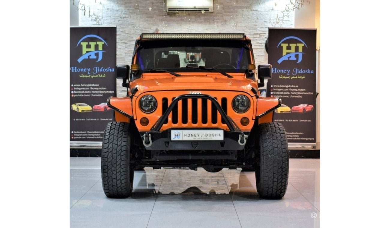 Jeep Wrangler EXCELLENT DEAL for our Jeep Wrangler SAHARA 2013 Model!! in Orange Color! GCC Specs