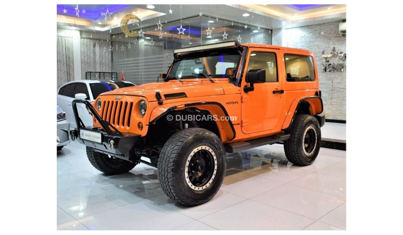 Jeep Wrangler EXCELLENT DEAL for our Jeep Wrangler SAHARA 2013 Model!! in Orange Color! GCC Specs