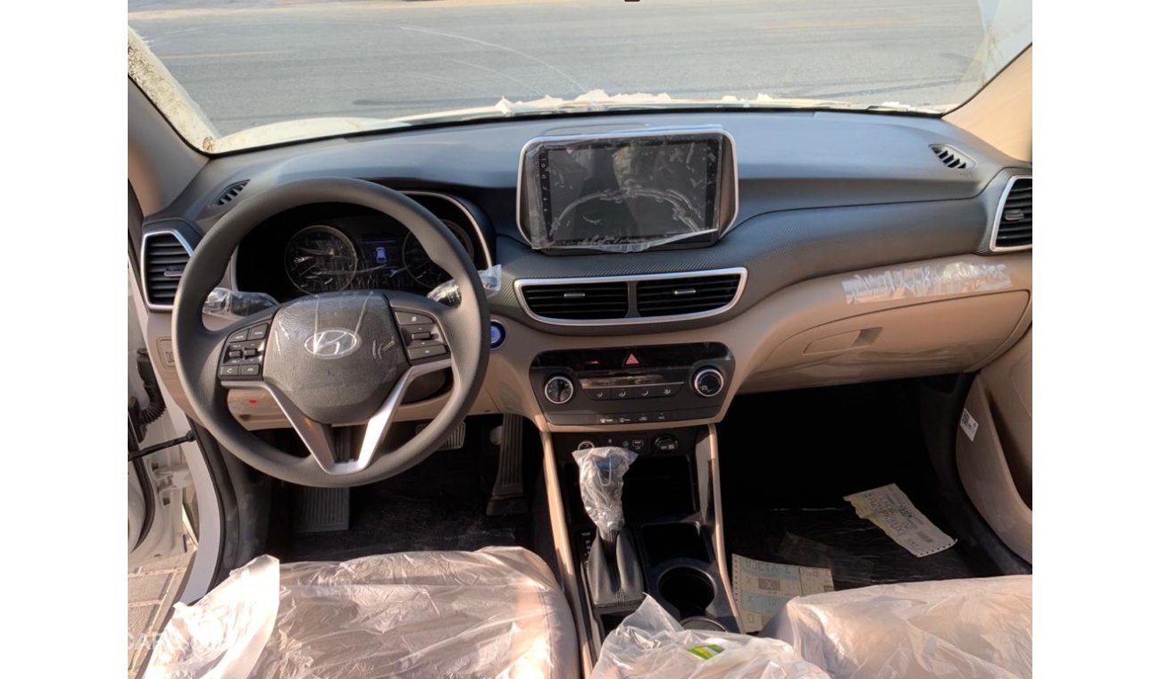 Hyundai Tucson 2.0L DOWN BRAKE, 1-Power Seat, DVD+Rear Camera, Alloy Rims 18'', Rear AC, Push Start