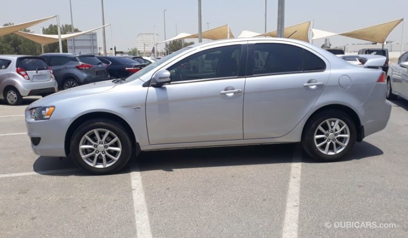 Mitsubishi Lancer السيارة نظيفه جدا بحاله ممتازه بدون حوادس ضمان شاسيه جير ماكينه