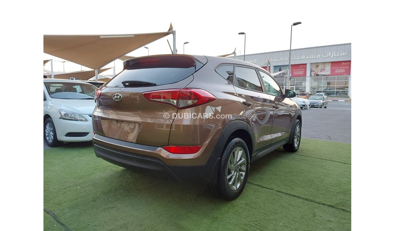 هيونداي توسون 2000 سى سى موديل 2016 مثبت سرعة تحكم رنجات  شاشة كاميرا حساسات بحالة ممتازة