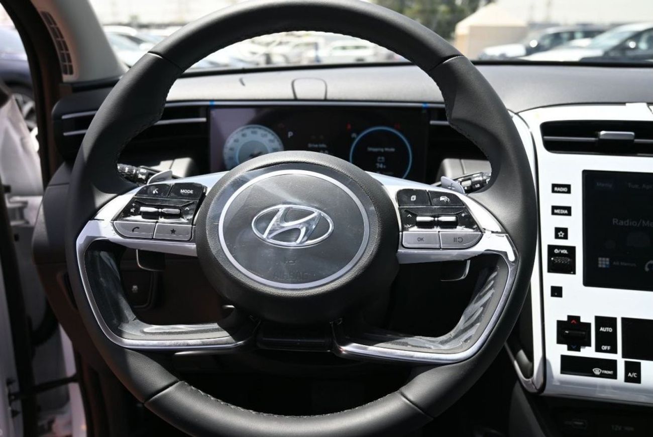 هيونداي توسون هيونداي توسون 1.6 لتر توربو دفع امامي دفع رباعي 5 ابواب عداد رقمي سقف بانورامي مقاعد كهربائية لون اب