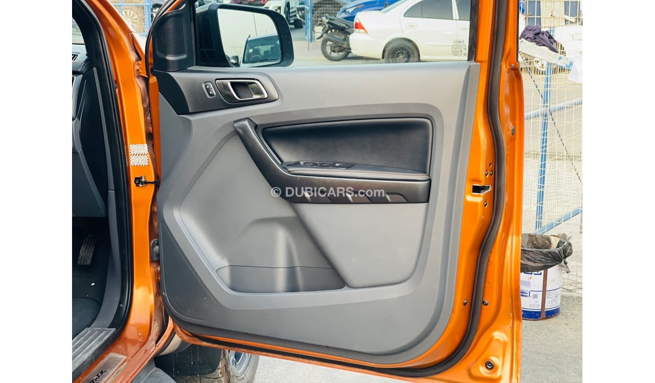 Ford Ranger Ford Ranger 2017 model for sale from Humera automobile motors in Dubai . Orange  2017 model . The ca