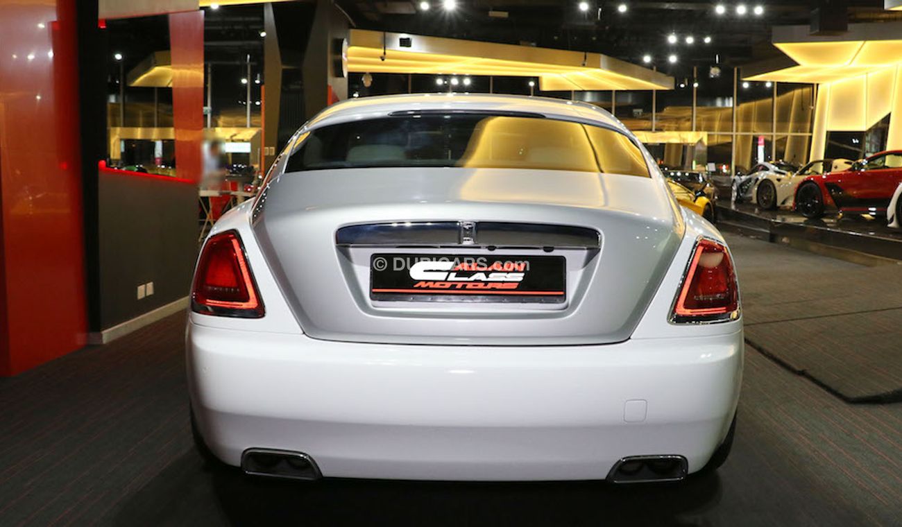 Rolls-Royce Wraith Original Color:  Brown | Silver  ( car with White Vinyl Sticker )