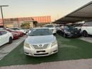 Toyota Camry 4-cylinder, first owner, two original keys