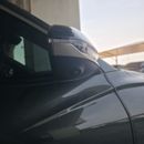 Hyundai Tucson PREMIUM PLUS An olive green car.