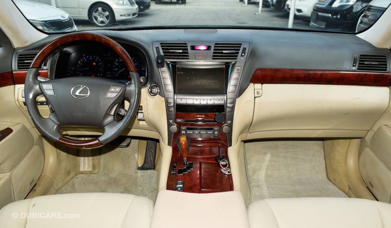 Lexus LS460 Imported 2008 black color inside beige number one leather hatch in excellent condition