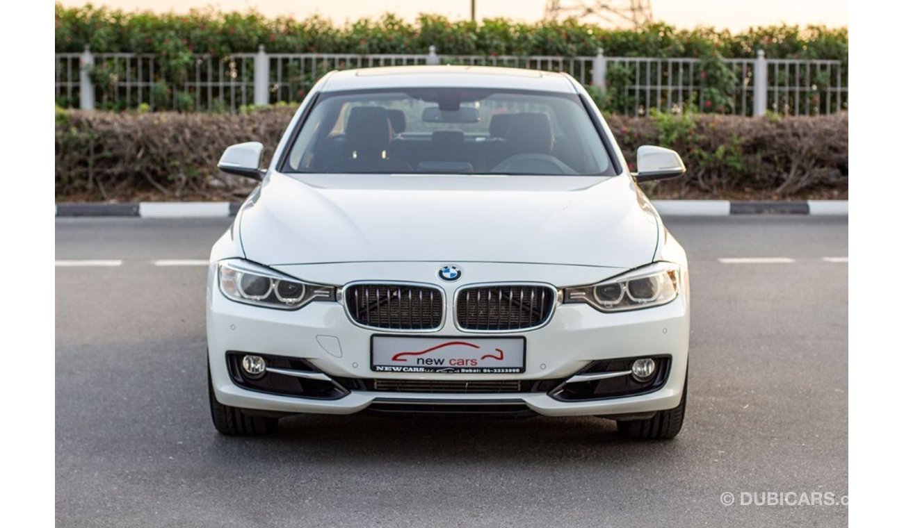 BMW 328i BMW 328I - 2014 - GCC - ASSIST AND FACILITY IN DOWN PAYMENT - 855 AED/MONTHLY - 1 YEAR WARRANTY