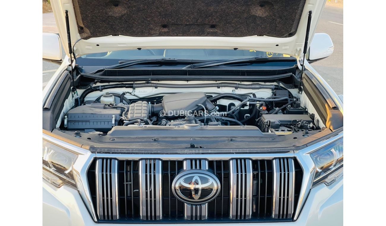 Toyota Prado Toyota prado Petrol  engine 2.7 model 2018 from japan white color 7 seater car very clean and good c