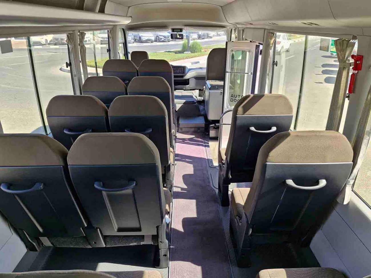 Toyota Coaster  ECTALM003 - 2026 Toyota Coaster – 2.8L Diesel Auto – 22 Seats, Cool Box
