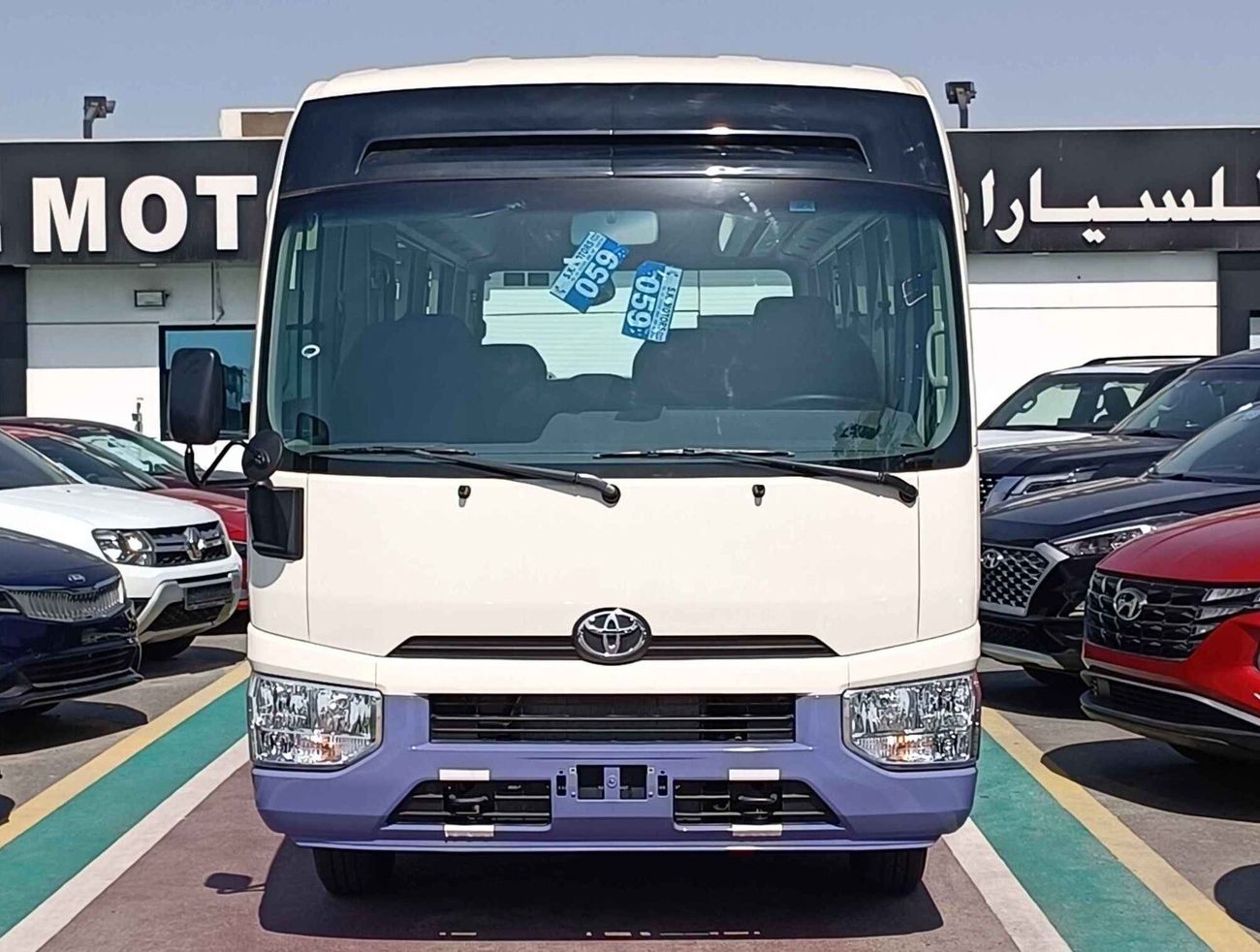 Toyota Coaster 4.2L V6 DIESEL / 23 STR M/T / AUTO DOOR /  LUGGAGE RACKS (CODE # CD42B)